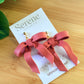 Statement Bow Dangles